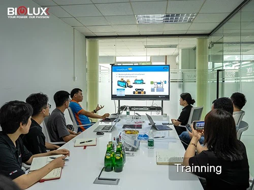 biglux office environment team working on mobile solar cctv tower business operations